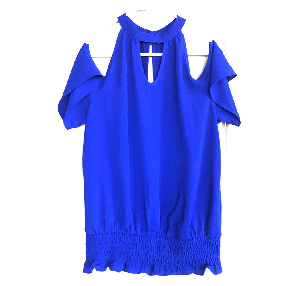 Woman’s blue top